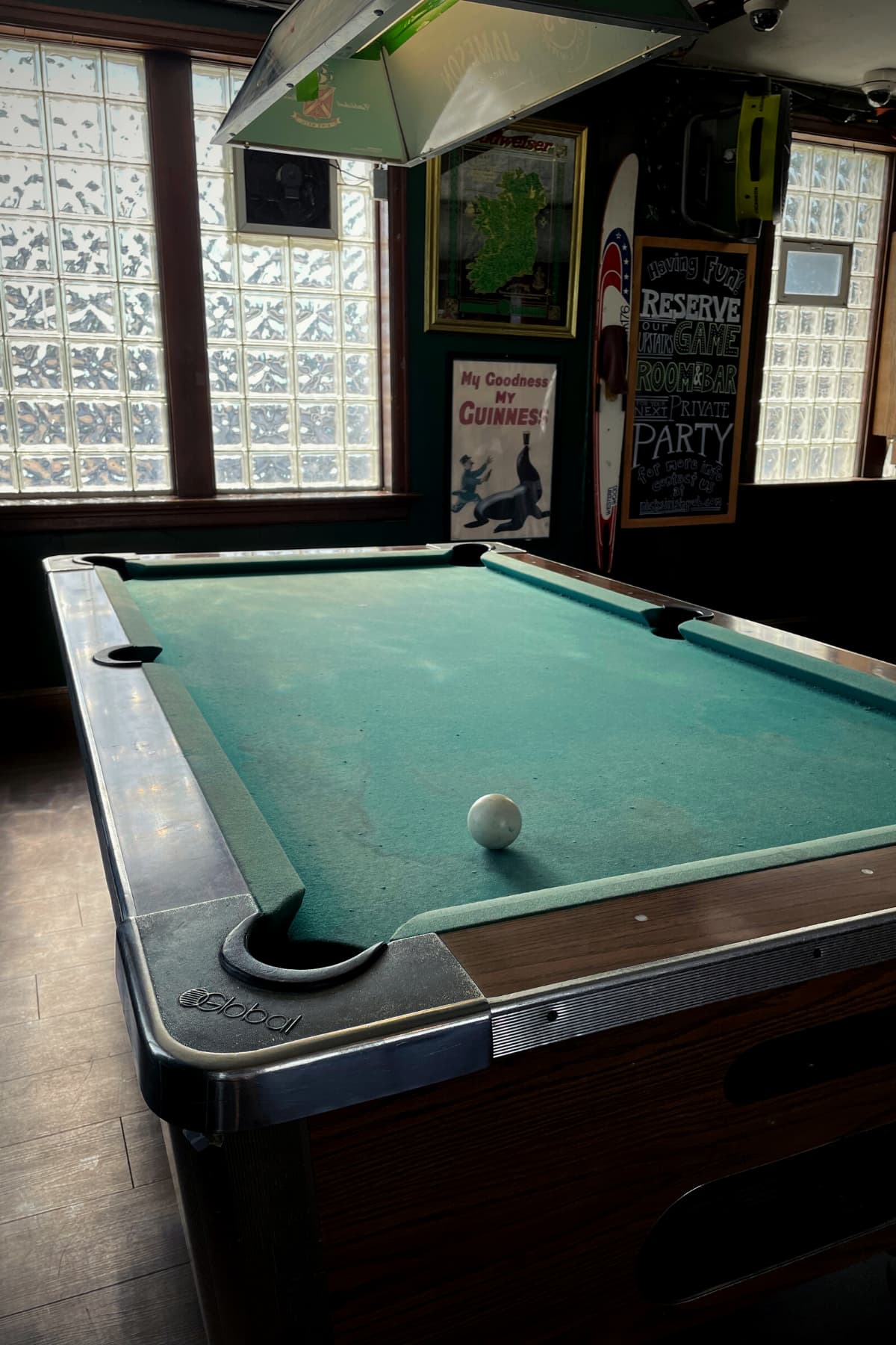 The pool table in the upstairs game room