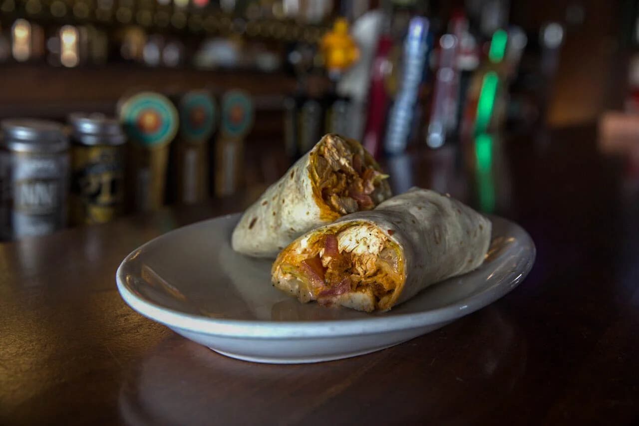 Fried chicken wrap cut in half